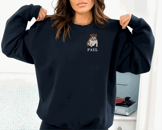 a woman wearing a sweatshirt with a dog on it